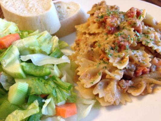 Rainbow Farfalle Pasta with Sausage, Tomato, and Cream